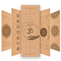 Cork yoga mat with Om symbol and hand design on a white background